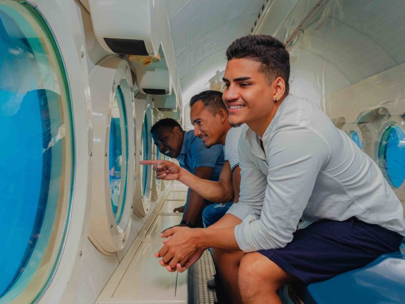 a man standing in front of a mirror posing for the camera